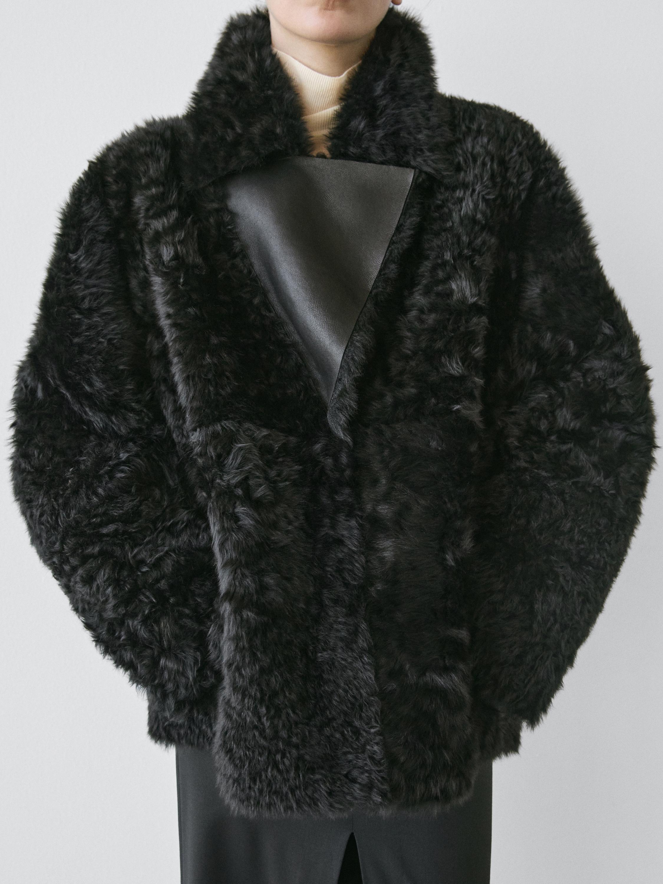 Sheepskin leather coat with lapel collar